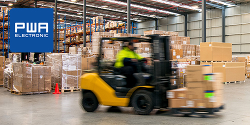 Forklift working at logistics warehouse